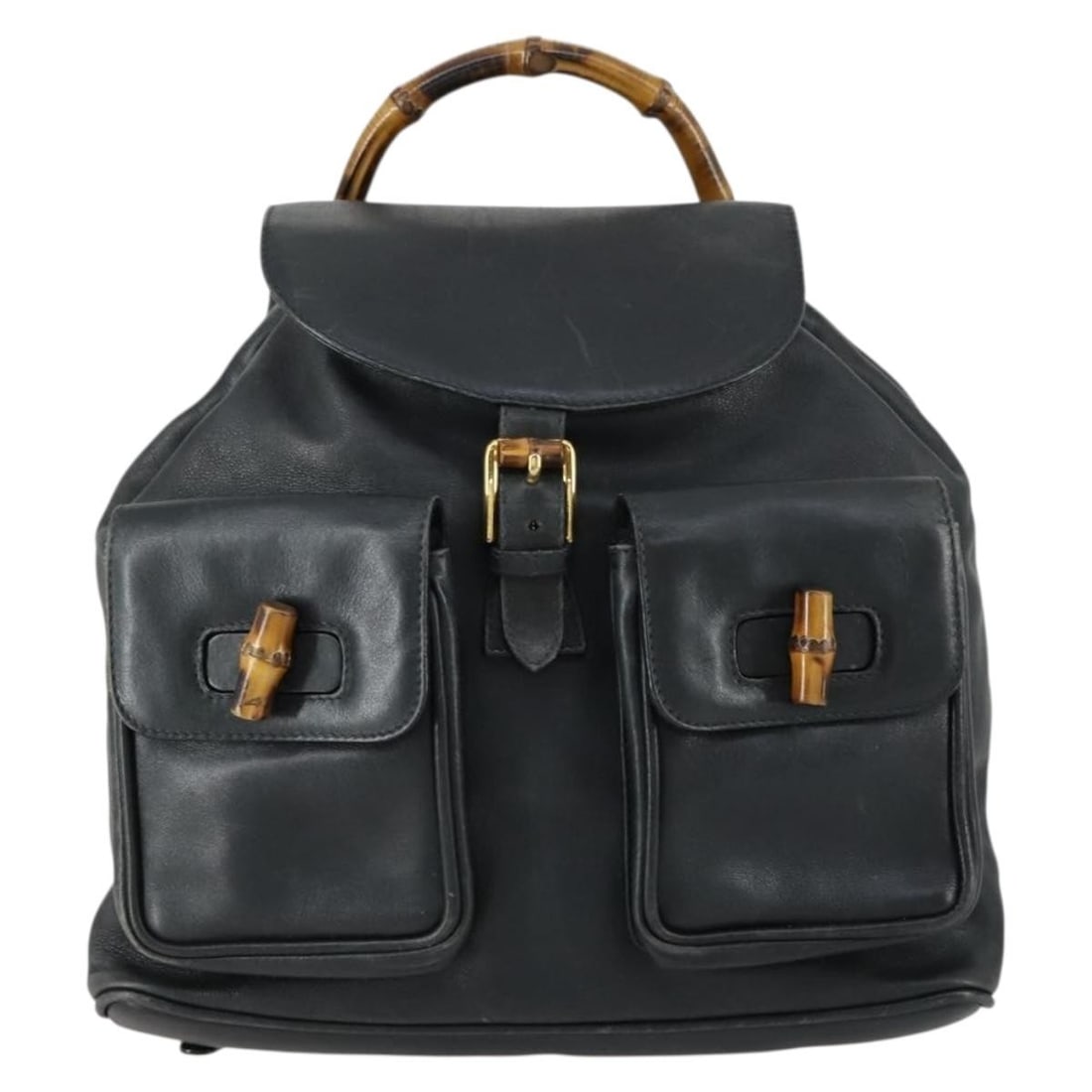 Black Leather Vintage Bamboo Backpack by Gucci for Women: Black Leather Vintage Bamboo Backpack by Gucci for Women This Gucci Vintage Bamboo Backpack is crafted from black leather and features the iconic bamboo detail. Designed for women, it offers a spaciou