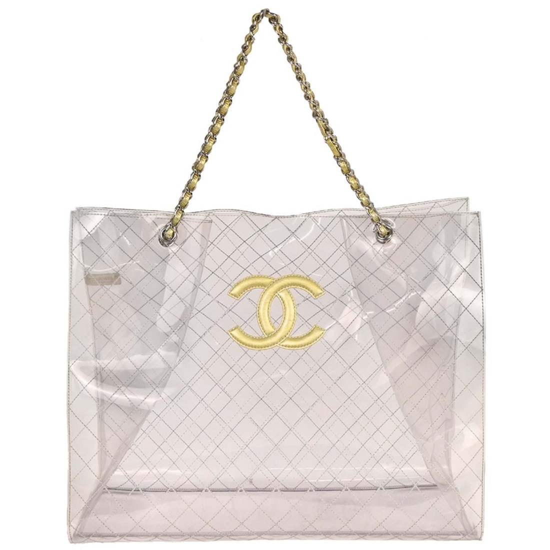 Chanel Clear PVC Extra Large Tote Handbag: Chanel Clear PVC Extra Large Tote Handbag This Chanel Clear PVC Tote Handbag is a stylish and functional accessory, perfect for everyday use. With its extra-large size and transparent design, it offer
