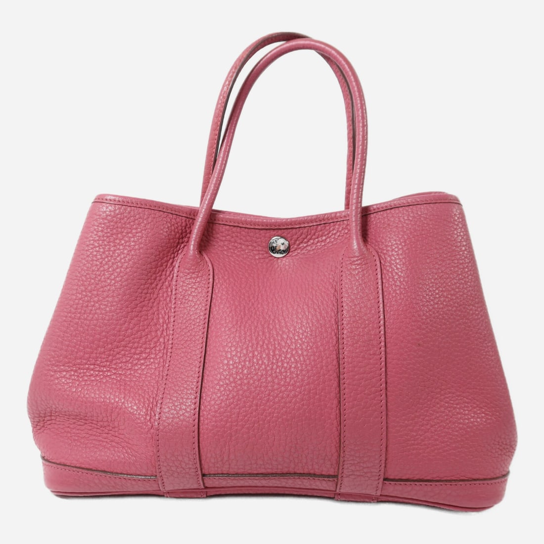 Hermes Garden Party TPM Pink Calfskin Tote with Palladium Hardware: Hermes Garden Party TPM Pink Calfskin Tote with Palladium Hardware This HERMES Garden Party TPM tote bag is crafted from Negonda calfskin leather in a pink color. The bag features a classic tote desig
