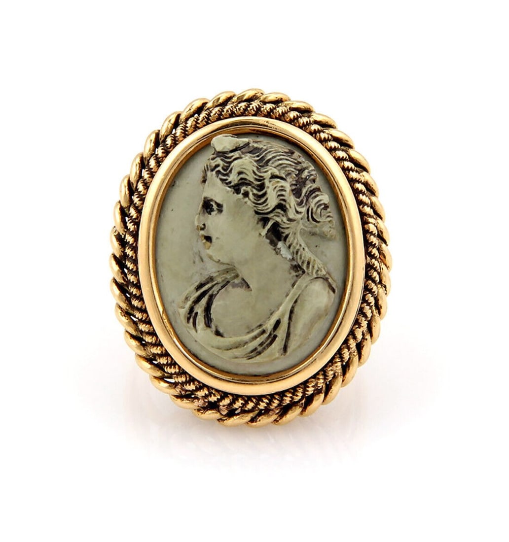 18k Yellow Gold Vintage Lady Cameo Lava Ring Size 6: 18k Yellow Gold Vintage Lady Cameo Lava Ring Size 6 This vintage ring features an oval lava lady cameo set in 18k yellow gold. The intricate detailing of the cameo highlights skilled craftsmanship, an