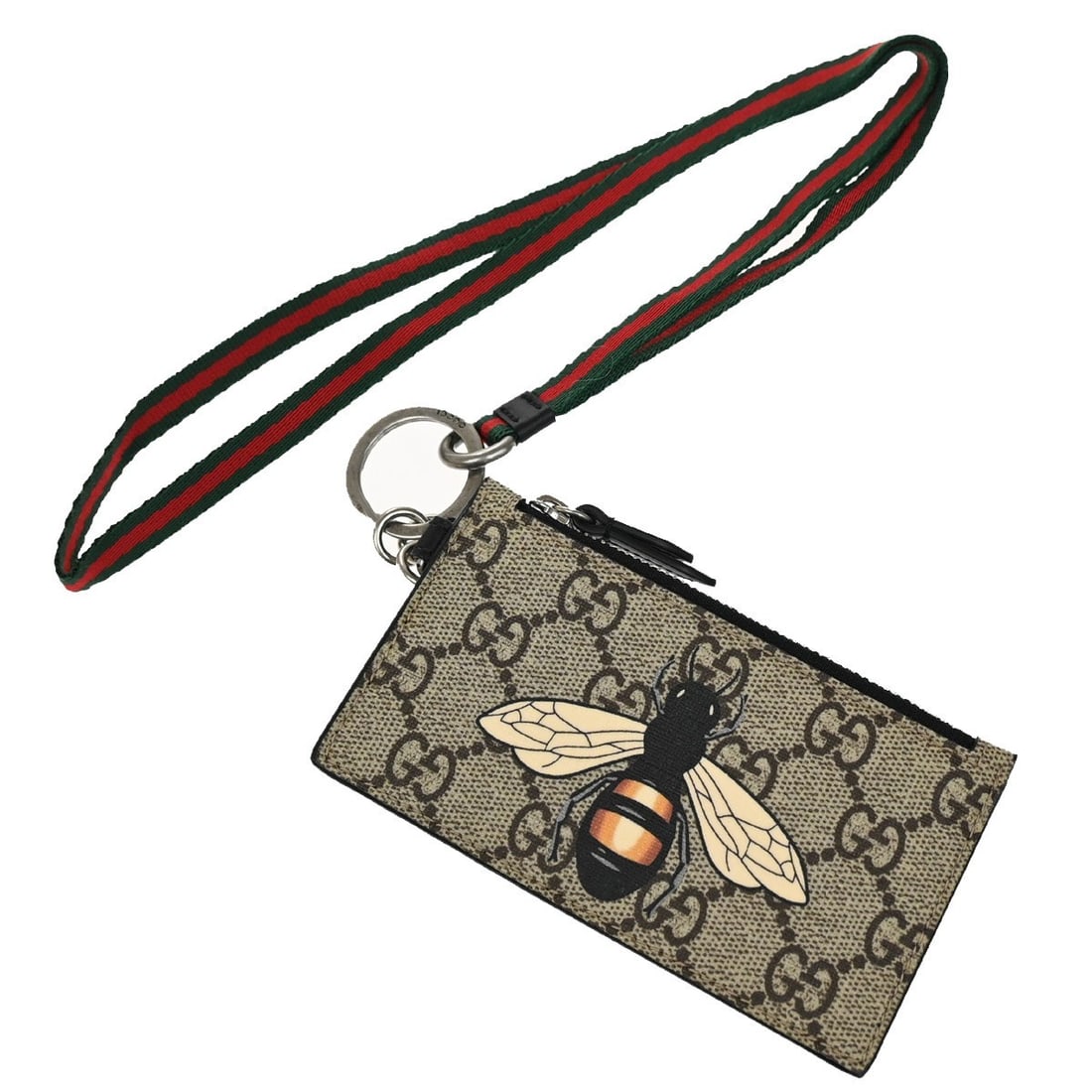 Gucci Leather Bee Card Holder in Brown Coated Canvas: Gucci Leather Bee Card Holder in Brown Coated Canvas This Gucci Bee Card Holder features a printed GG coated canvas design with leather accents. It is designed for female use and presents a brown colo