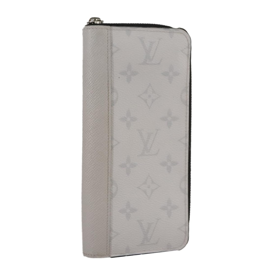 Vertical Zippy Leather Wallet by Louis Vuitton in White: Vertical Zippy Leather Wallet by Louis Vuitton in White This Louis Vuitton Zippy wallet vertical is crafted from white Taiga leather designed for women. It features a compact vertical design with meta