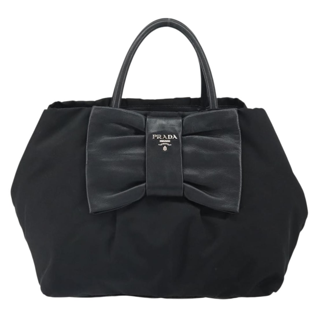 Prada Bow Tote Black Nylon and Leather Handbag: Prada Bow Tote Black Nylon and Leather Handbag This Prada Bow Tote features black nylon material complemented by leather accents. Designed for women, it offers a spacious interior and practical compar