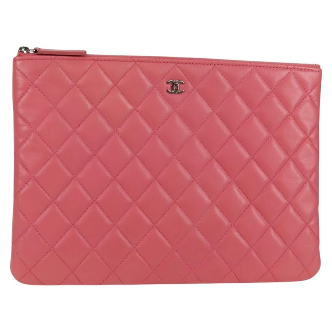 Pink Chanel O Case Quilted Leather Clutch Bag: Pink Chanel O Case Quilted Leather Clutch Bag This Chanel O Case Clutch is crafted from quilted pink leather, designed for women. Made in Italy, it features a spacious interior with slight rubbing on