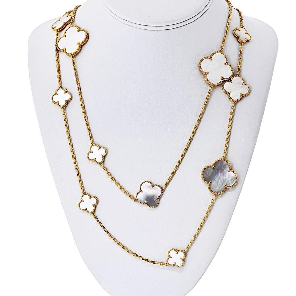 Van Cleef & Arpels 18K Yellow Gold 16 Motif Alhambra Necklace: Van Cleef & Arpels 18K Yellow Gold 16 Motif Alhambra Necklace This exquisite Van Cleef & Arpels necklace features 16 motifs crafted in luxurious 18K yellow gold, showcasing the brand's iconic Alhambra