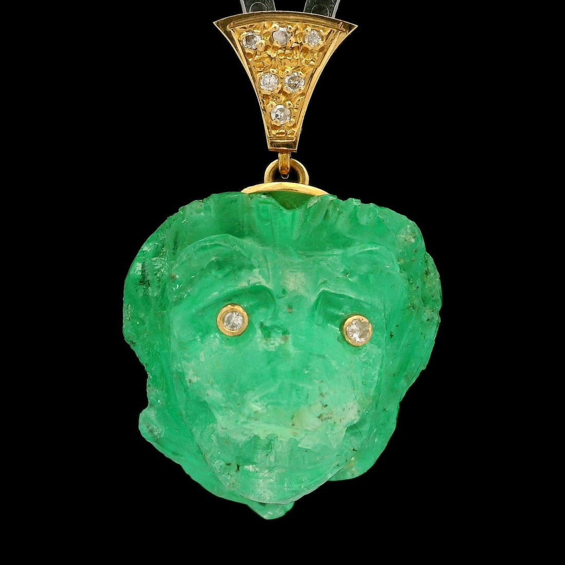 Vintage 18k Gold Carved Lion Head Emerald Diamond Pendant GIA Certified 48ct: Vintage 18k Gold Carved Lion Head Emerald Diamond Pendant GIA Certified 48ct This exquisite vintage pendant features a beautifully carved lion head made from a natural Colombian emerald weighing 48.50