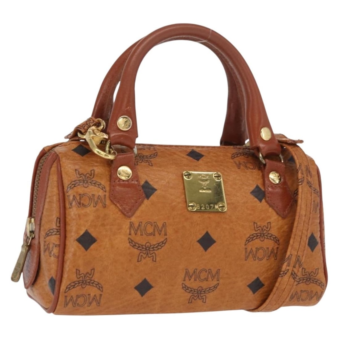 Mini Brown Gold MCM Vicetos Logogram PVC Leather Convertible Handbag with Strap: Mini Brown Gold MCM Vicetos Logogram PVC Leather Convertible Handbag with Strap This MCM Vicetos Logogram mini handbag features a brown and gold design crafted from PVC leather. The bag offers versati