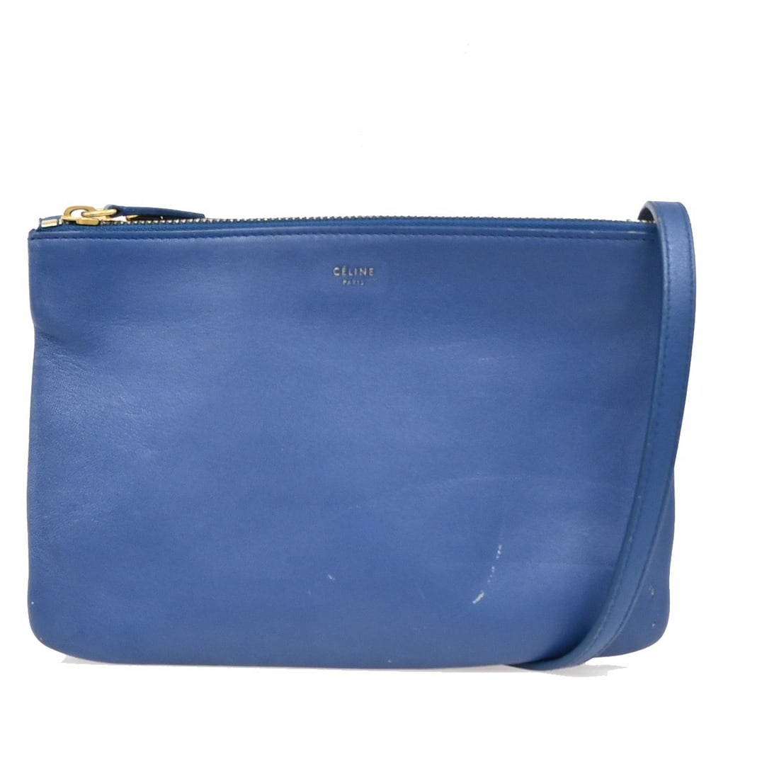 Celine Leather Trio Crossbody Bag in Blue for Women: Celine Leather Trio Crossbody Bag in Blue for Women The Celine Trio Crossbody Bag for women is crafted from blue leather and features three compartments for organized storage. Made in Italy, this styl