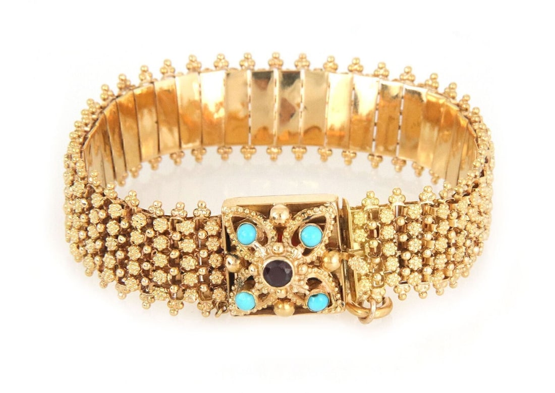 Portuguese 19k Gold Bracelet with Garnet and Turquoise Stones Vintage Chain: Portuguese 19k Gold Bracelet with Garnet and Turquoise Stones Vintage Chain This vintage Portuguese flex bracelet features vibrant garnet and turquoise gemstones set in 19k yellow gold. The chain-styl