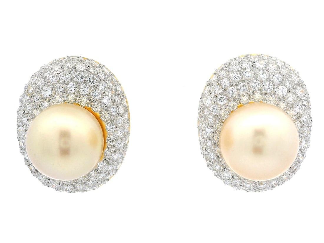 18k Yellow Gold GIA Certified Golden Pearl Diamond Oval Button Earrings: 18k Yellow Gold GIA Certified Golden Pearl Diamond Oval Button Earrings Adorn your ears with these exquisite 18k Gold GIA Saltwater Golden Pearls and Pave Set Diamond Oval Button Earrings. Featuring t