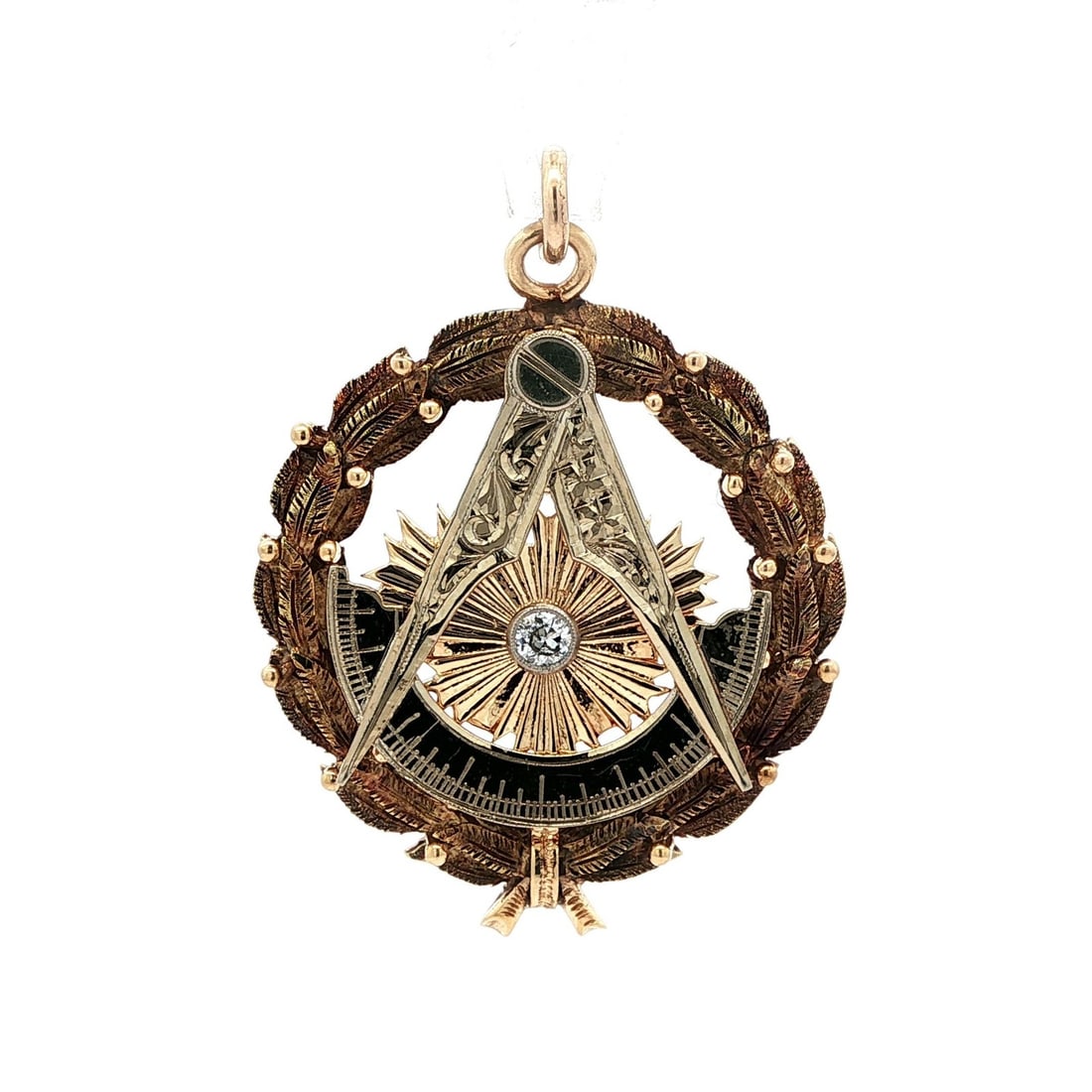 Vintage 14k Gold Masonic Pendant with Diamond 0.14ct Engraved: Vintage 14k Gold Masonic Pendant with Diamond 0.14ct Engraved This vintage pendant showcases a beautifully detailed Free Mason Masonic wreath design, crafted from solid yellow gold with elements of wh