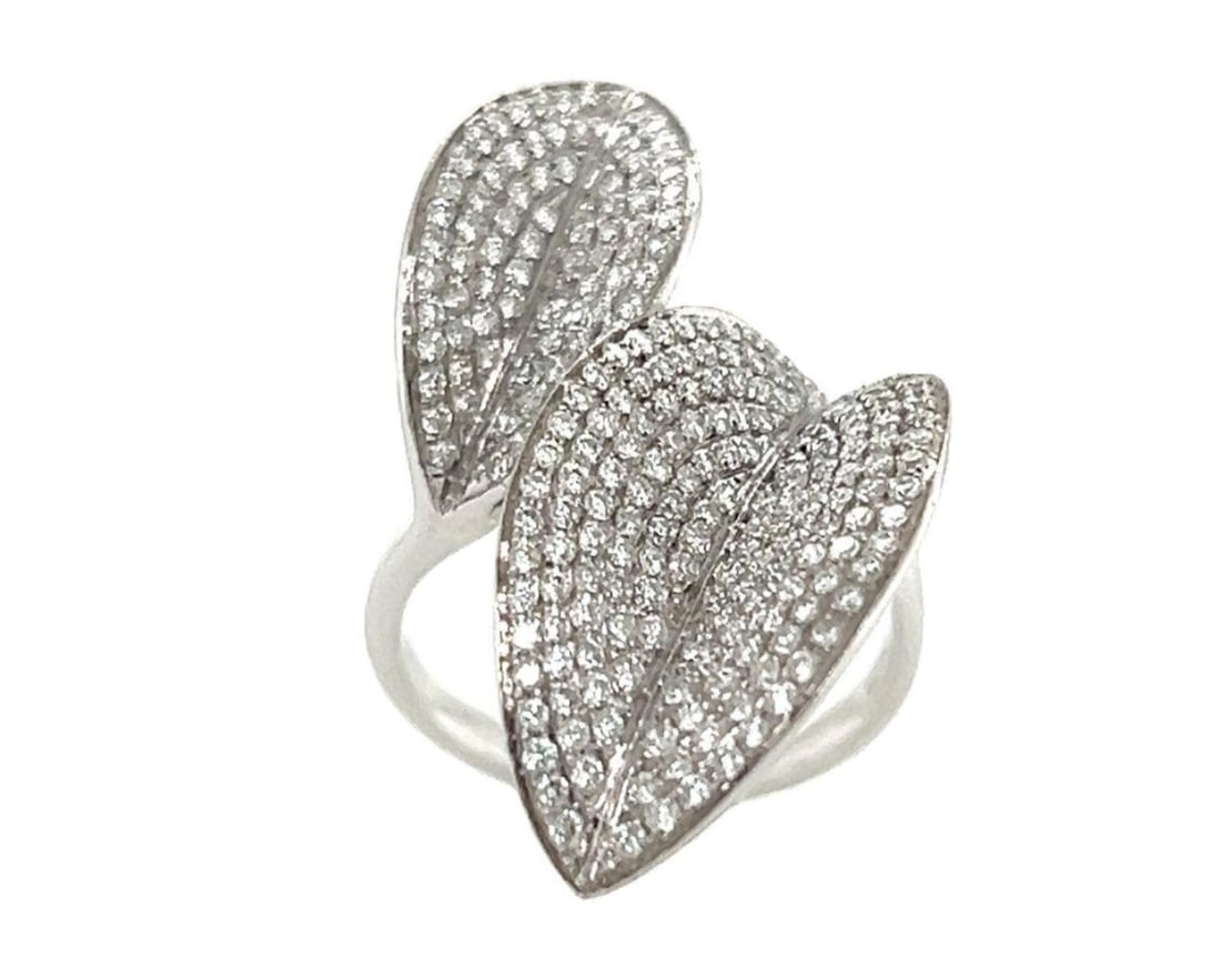 14k White Gold Diamond Leaf Motif Bypass Ring Size 7.5: 14k White Gold Diamond Leaf Motif Bypass Ring Size 7.5 This elegant ring features a bypass design with diamond-accented leaf motifs crafted in 14k white gold. The ring showcases a total diamond weight