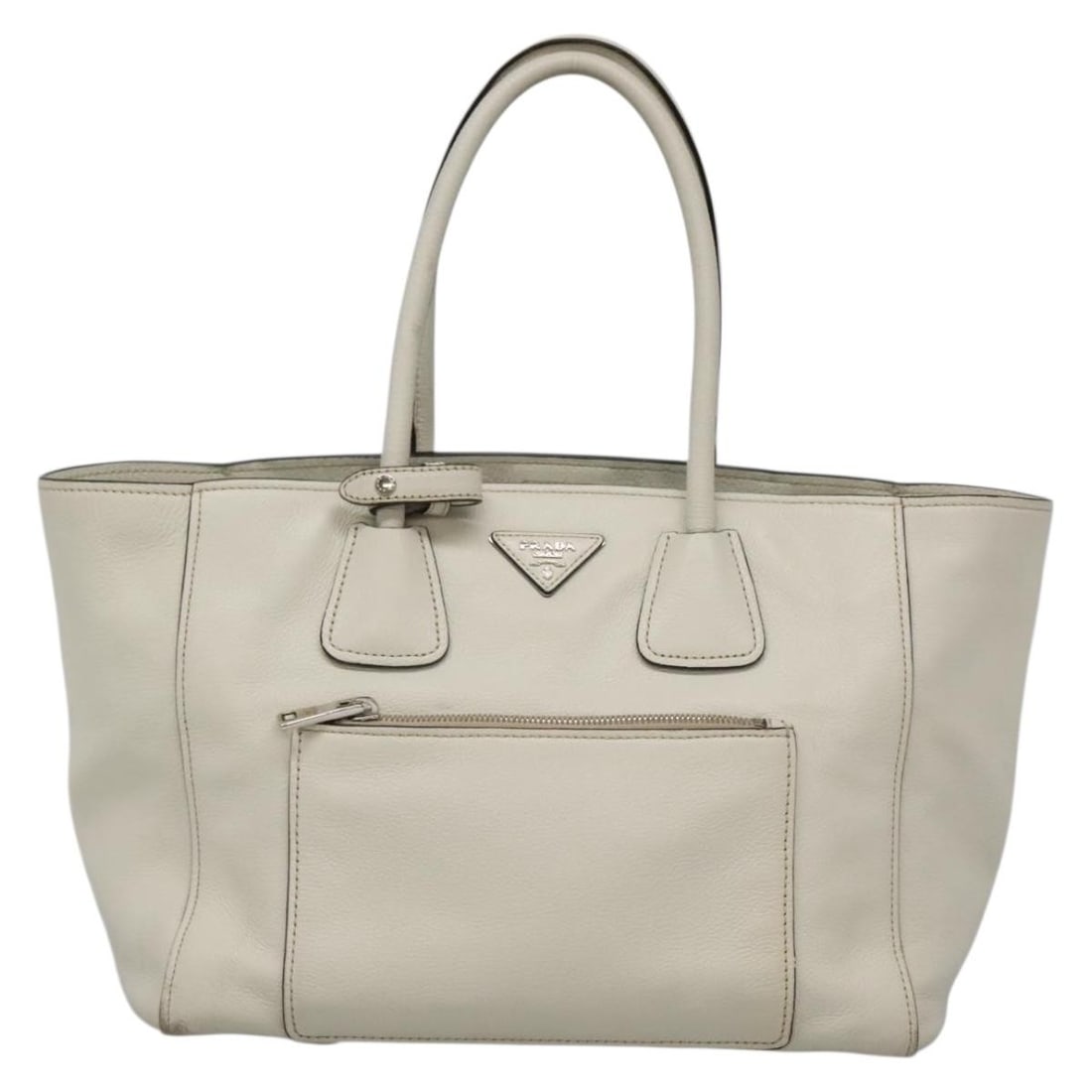 Prada Vitello Daino White Leather Front Pocket Convertible Tote Bag: Prada Vitello Daino White Leather Front Pocket Convertible Tote Bag This Prada Front Pocket Wing Convertible Tote is crafted from white leather and designed for women. Made in Italy, it features a spa