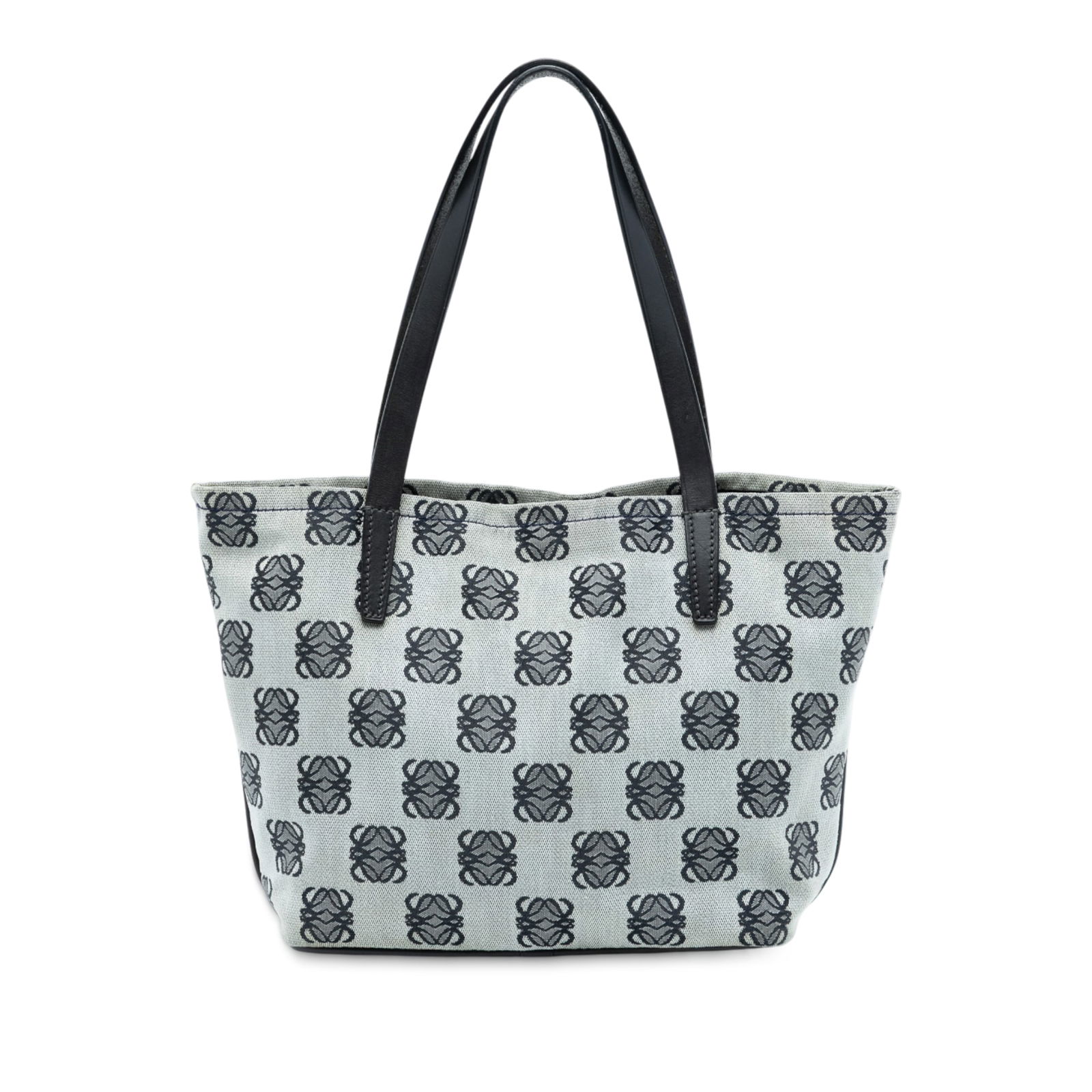 Canvas Tote Bag with Anagram Design and Leather Handles by LOEWE: Canvas Tote Bag with Anagram Design and Leather Handles by LOEWE This LOEWE Anagram Canvas Tote features a canvas body with flat leather handles, an open top secured by a lobster clasp closure, and in