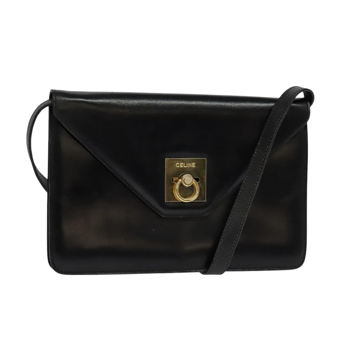 Celine Black Leather Envelope Style Shoulder Bag: Celine Black Leather Envelope Style Shoulder Bag This Celine Envelope Shoulder Bag is crafted from black leather and designed for women. It features a sleek silhouette with an envelope-style flap and