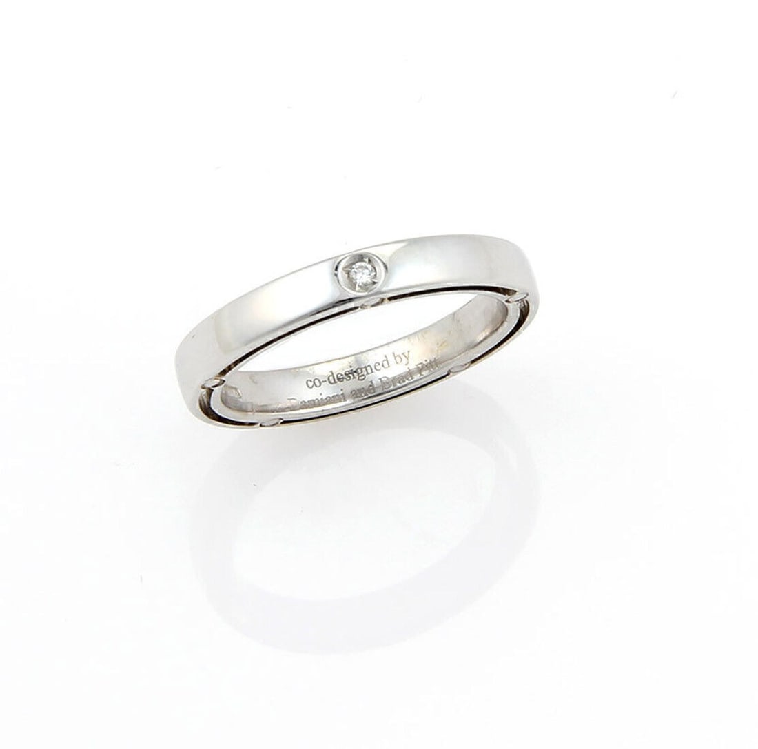 Size 5 Damiani 18k White Gold Diamond 3mm Band Ring: Size 5 Damiani 18k White Gold Diamond 3mm Band Ring This authentic Damiani band ring is crafted from 18k white gold and features a sleek 3mm wide band set with a genuine diamond. Showcasing refined It