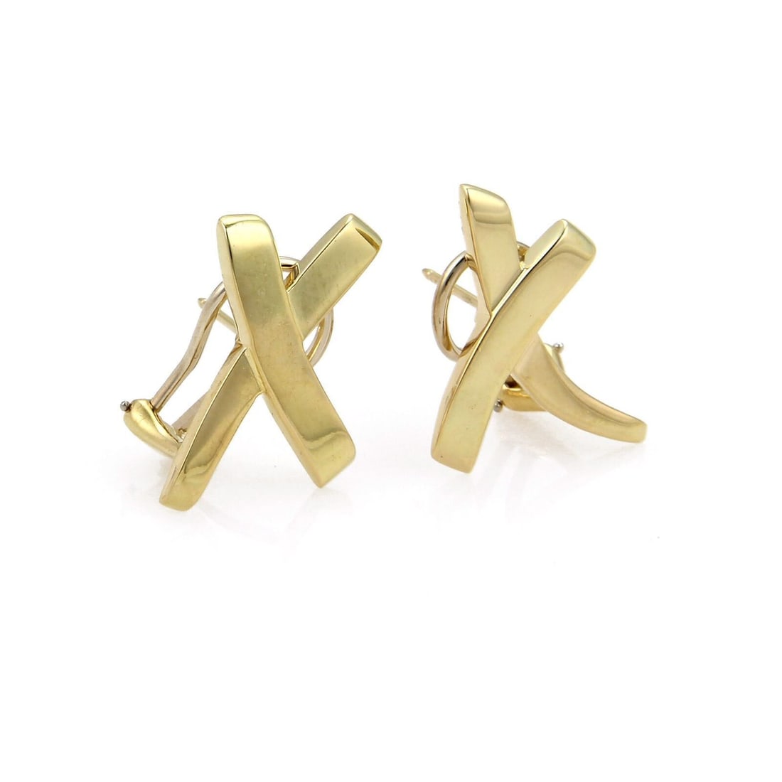 Paloma Picasso 18k Gold Kiss X Clip Earrings by Tiffany & Co.: Paloma Picasso 18k Gold Kiss X Clip Earrings by Tiffany & Co. These Tiffany & Co. Paloma Picasso large Kiss X post clip earrings are crafted in solid 18k yellow gold. Featuring the iconic stylized kis