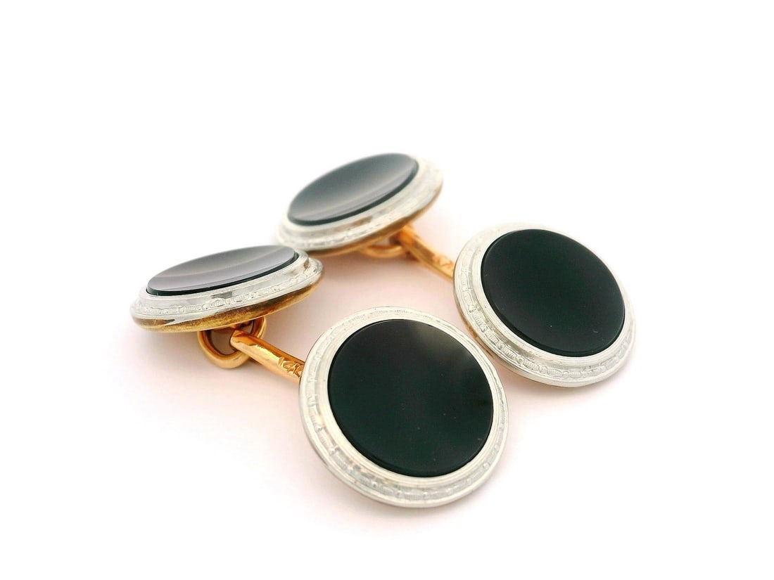 Krementz 14k Yellow Gold Platinum Black Onyx Round Cufflinks: Krementz 14k Yellow Gold Platinum Black Onyx Round Cufflinks These exquisite Krementz cufflinks feature a striking design crafted from 14k solid yellow gold with a platinum top. Each cufflink is adorn