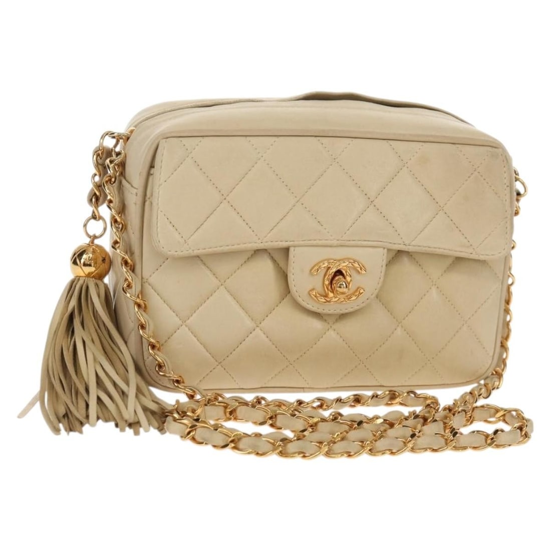 Beige Lambskin Matelasse Chain Flap Shoulder Bag by Chanel: Beige Lambskin Matelasse Chain Flap Shoulder Bag by Chanel This Chanel Chain Flap Shoulder Bag features a classic quilted lambskin leather exterior in beige. Designed for women, it offers a timeless s