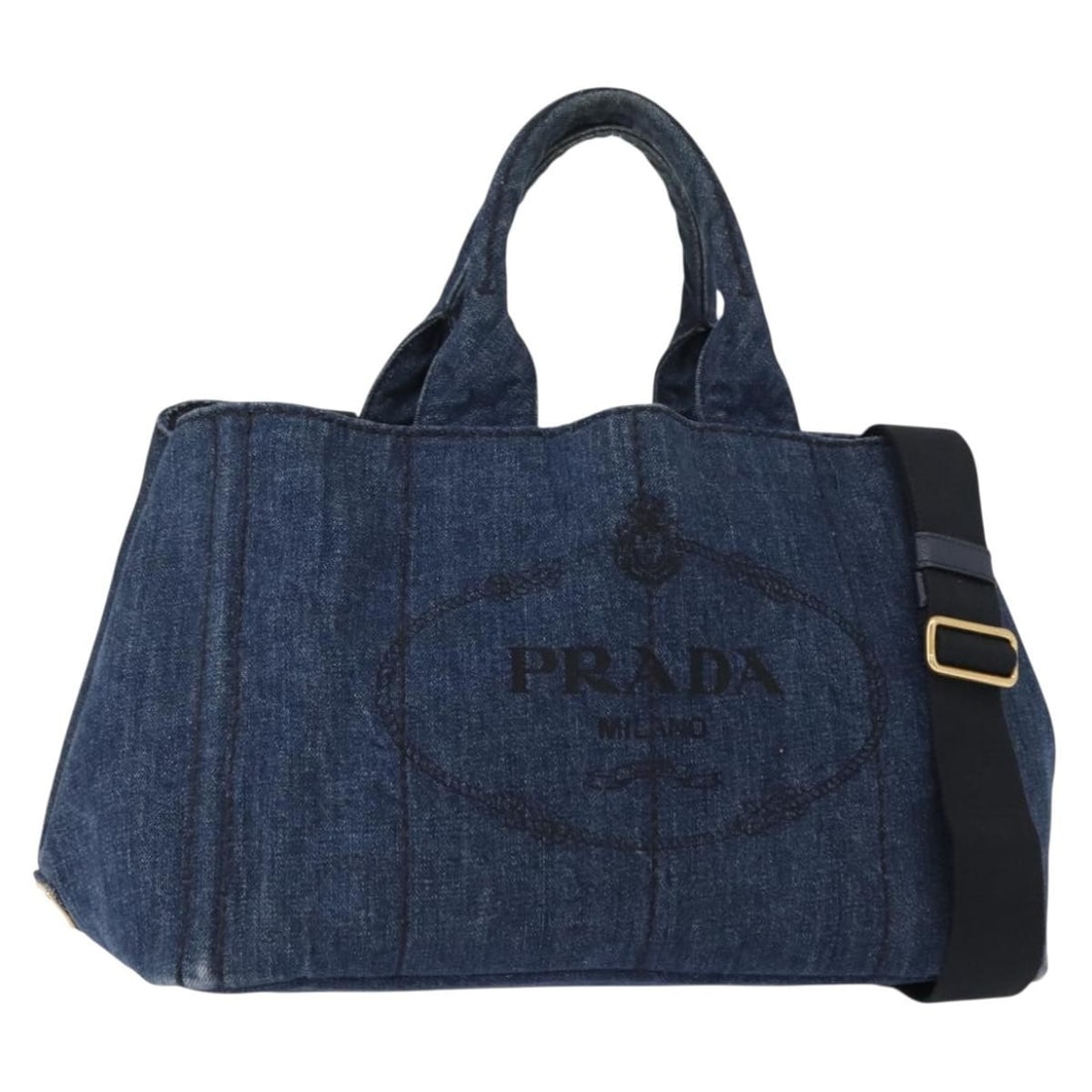Prada Canapa MM Canvas Blue Tote Bag 34cm by 21cm by 21cm: Prada Canapa MM Canvas Blue Tote Bag 34cm by 21cm by 21cm This Prada Canapa MM open tote is crafted from blue canvas, designed for women. The pre-owned handbag features a spacious interior and multipl