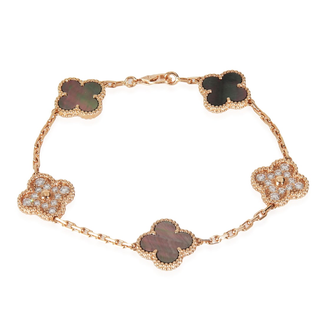Vintage Alhambra Rose Gold Diamond Mother of Pearl Bracelet by Van Cleef & Arpels: Vintage Alhambra Rose Gold Diamond Mother of Pearl Bracelet by Van Cleef & Arpels This Van Cleef & Arpels Vintage Alhambra bracelet features 18k rose gold with white mother of pearl motifs and round b