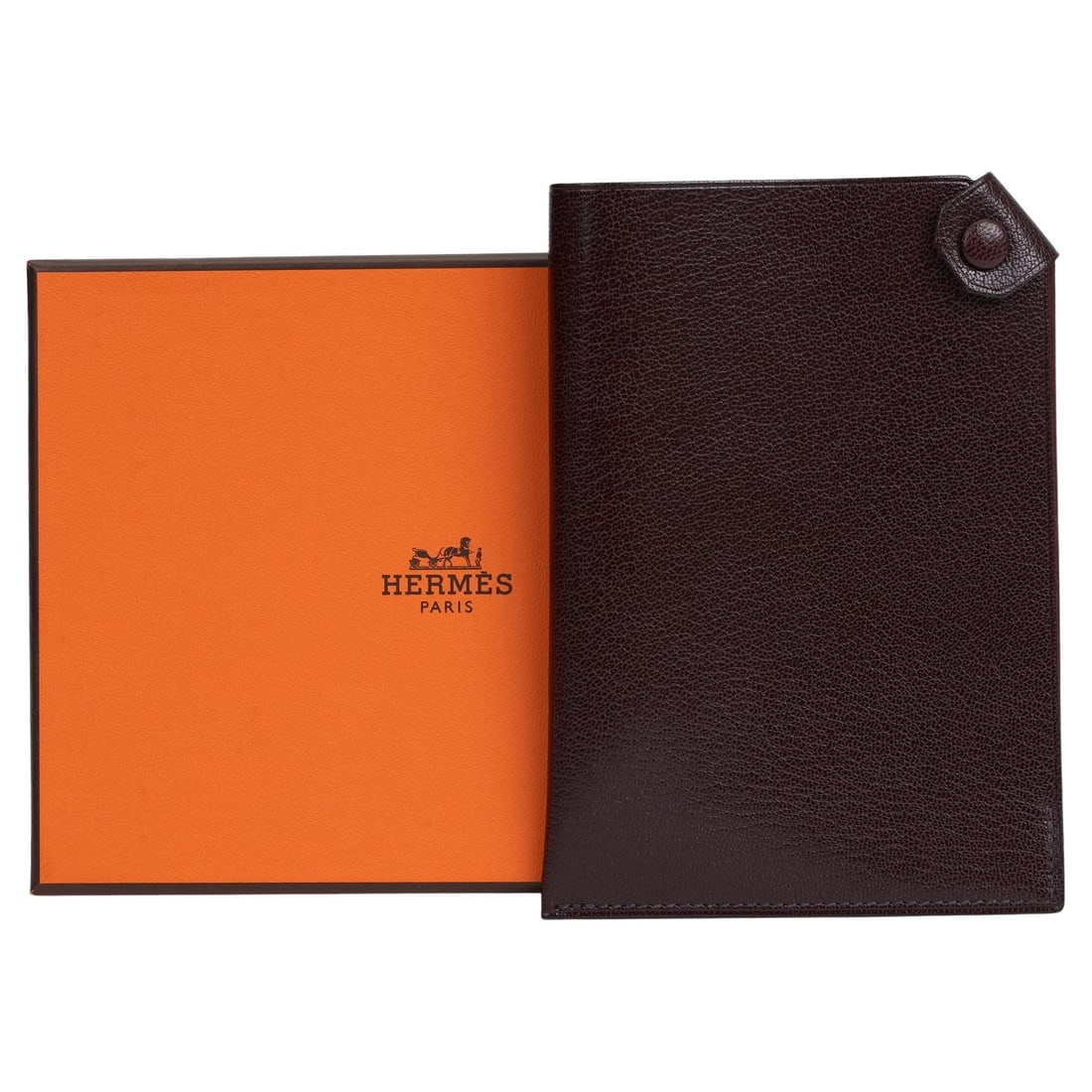 Hermes Rouge H Passport Holder Chevre Calfskin France: Hermes Rouge H Passport Holder Chevre Calfskin France This luxurious Hermes Passport Holder is crafted from high-quality chevre (goatskin) calfskin and features a sleek snap closure with palladium pla