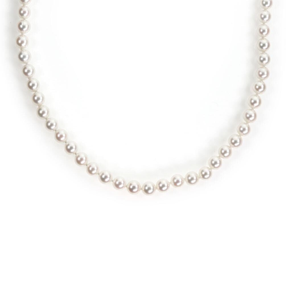 Beaded Pearl Necklace with 18k White Gold Clasp by Tiffany & Co.: Beaded Pearl Necklace with 18k White Gold Clasp by Tiffany & Co. This Tiffany & Co. necklace features lustrous pearls accented by a signature clasp crafted in 18k white gold. The beaded design offers