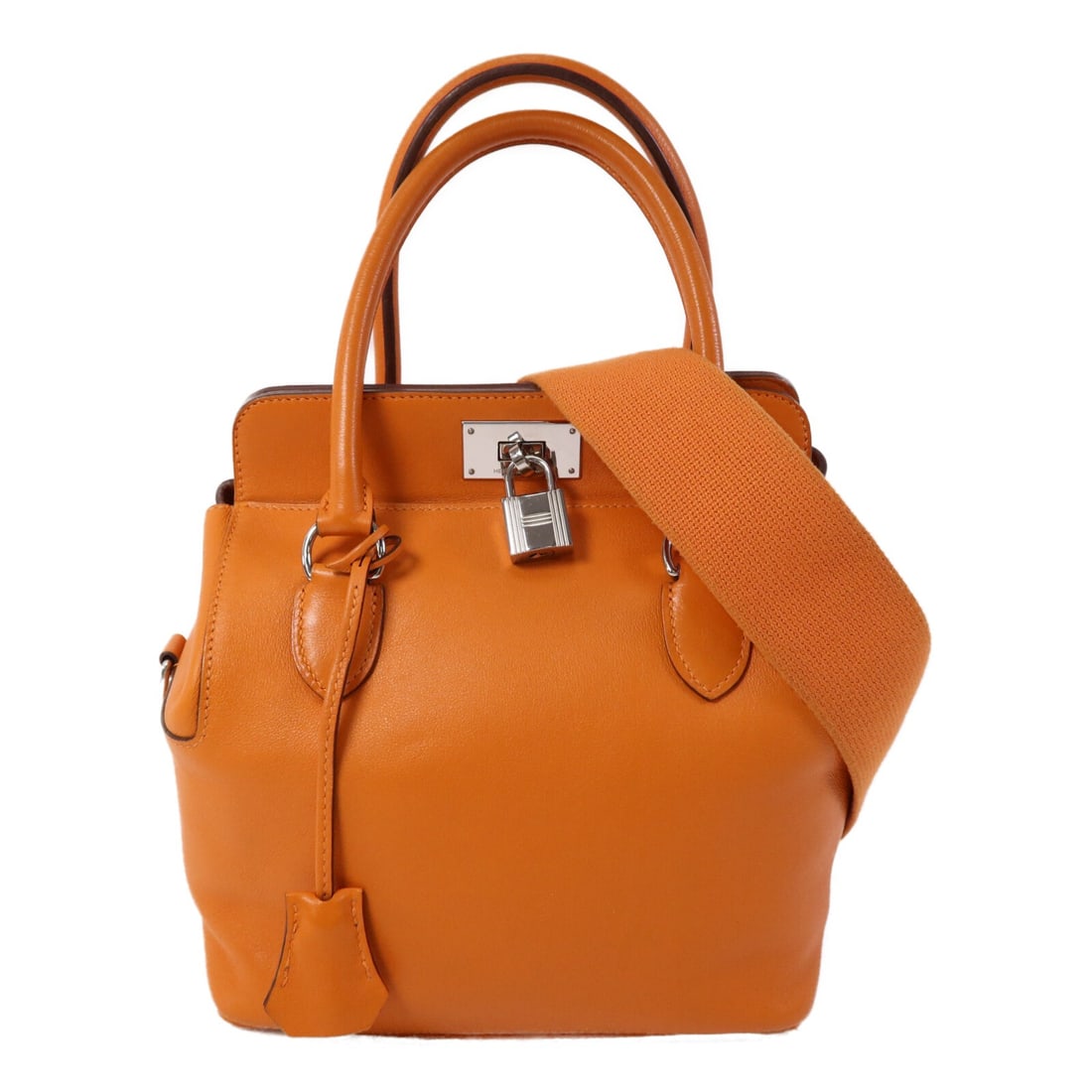 Hermes Toolbox 20 Taurillon Clemence Orange Calfskin Two Way Shoulder Bag: Hermes Toolbox 20 Taurillon Clemence Orange Calfskin Two Way Shoulder Bag This Hermes Tool Box 20 is a versatile 2-way shoulder bag crafted from Taurillon Clemence calfskin leather in orange. It featu