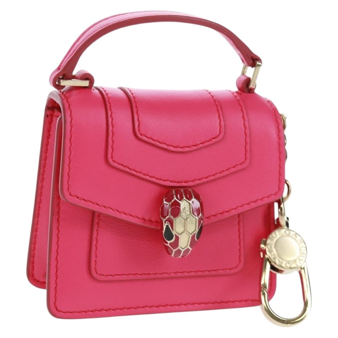 Pink Leather Bag Charm by BVLGARI Made in Italy: Pink Leather Bag Charm by BVLGARI Made in Italy This BVLGARI bag charm is crafted from pink leather and features a compact and stylish design. Made in Italy, it is in pristine, un-used condition with