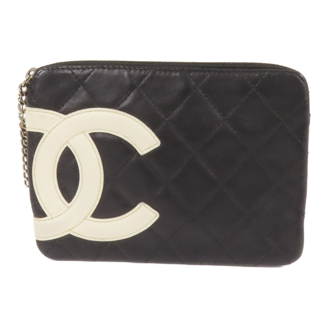 Black Lambskin Small Pouch by Chanel with Silver CC Hardware: Black Lambskin Small Pouch by Chanel with Silver CC Hardware This CHANEL pouch features luxurious black lambskin leather and silver-tone hardware. Crafted in France, it offers a compact and elegant de