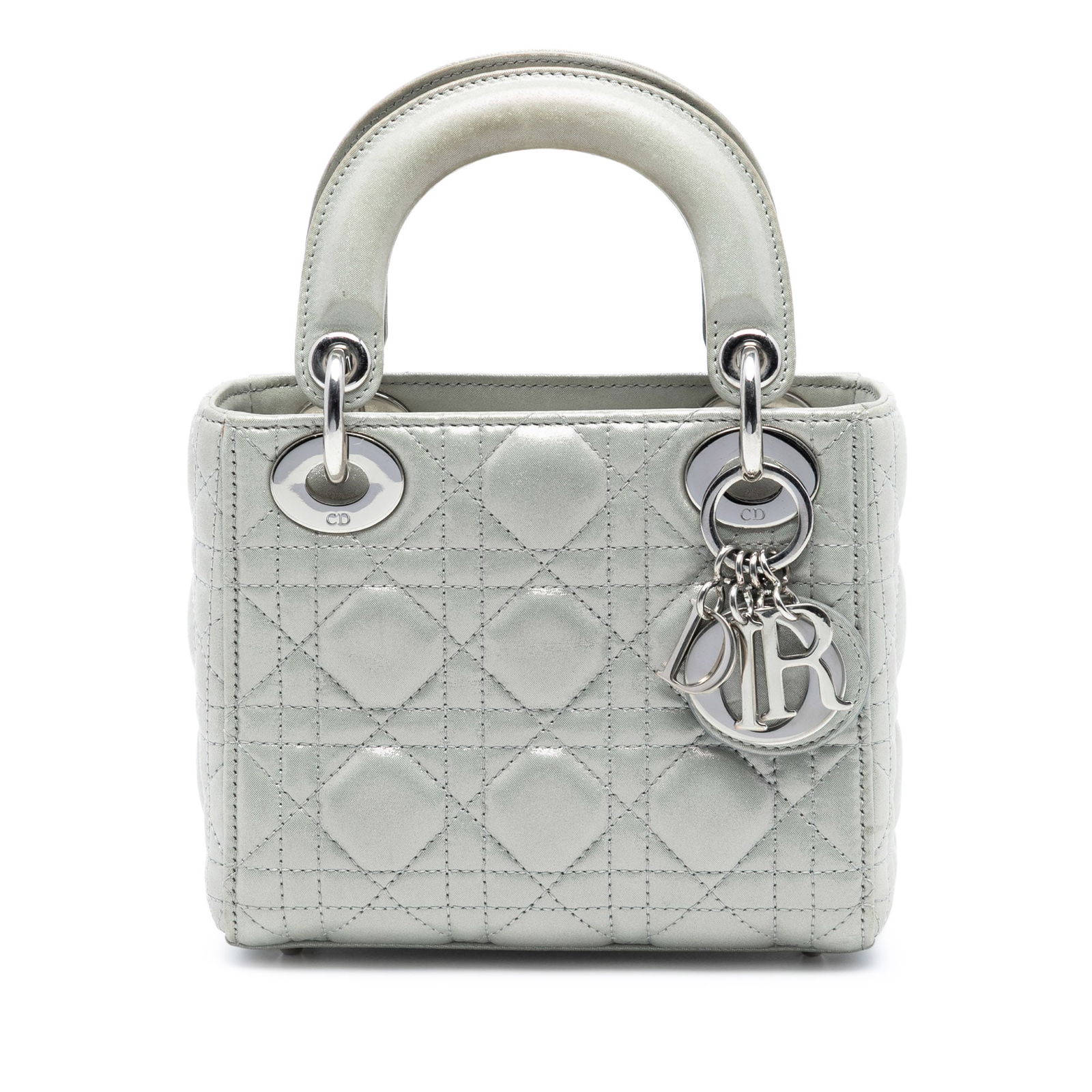 Dior Mini Lady Dior Silver Iridescent Cannage Lambskin Handbag: Dior Mini Lady Dior Silver Iridescent Cannage Lambskin Handbag This Lady Dior bag features an iridescent quilted lambskin leather body in silver, flat leather top handles, a fold-in flap closure, and