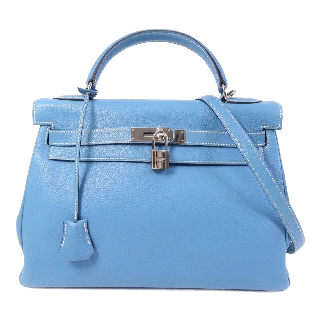 Blue Jean Togo Leather Kelly 32 Shoulder Bag by Hermes: Blue Jean Togo Leather Kelly 32 Shoulder Bag by Hermes This Hermes Kelly 32 shoulder bag is crafted from Togo calfskin leather in a Blue Jean color. Designed for versatile wear, it features a two-way