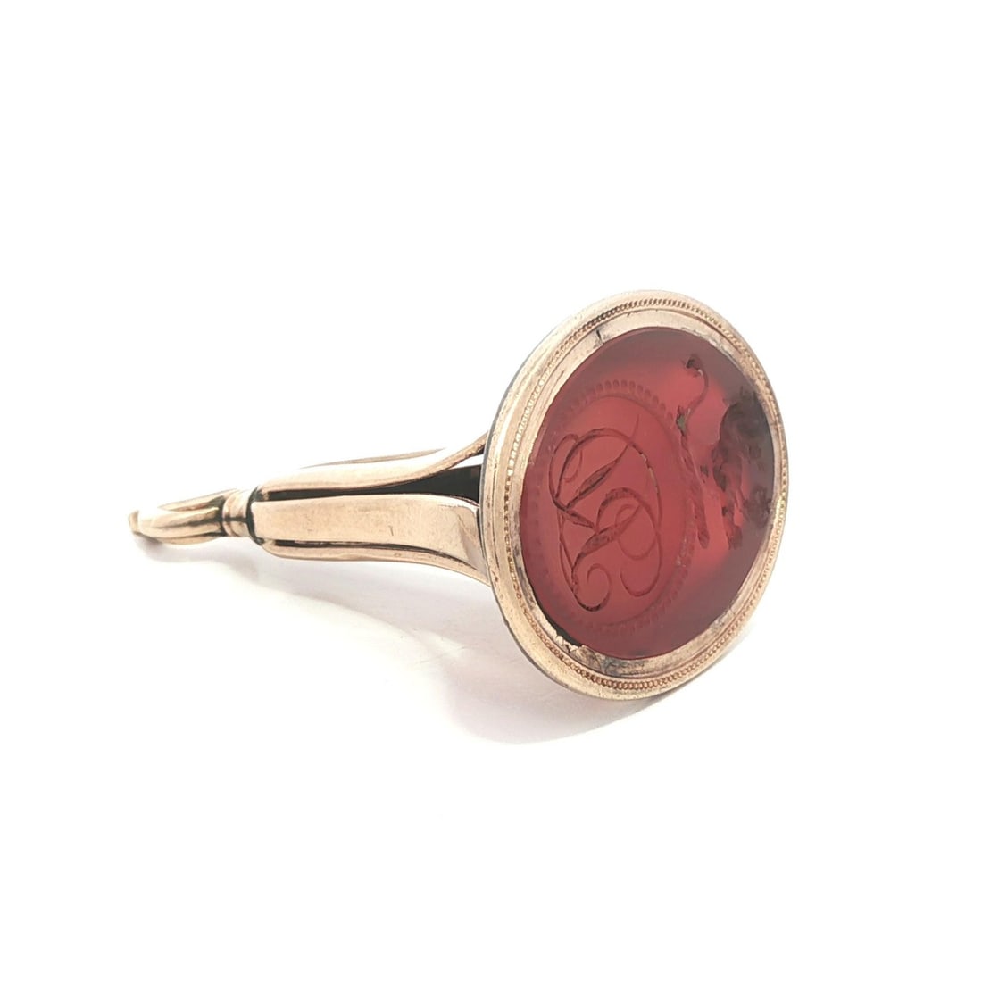 Victorian Era Yellow Gold Pendant With Carved Carnelian Intaglio Seal: Victorian Era Yellow Gold Pendant With Carved Carnelian Intaglio Seal This antique Victorian pendant features a carved intaglio natural carnelian seal in an oval cut, bezel set in solid 10k-12k yellow