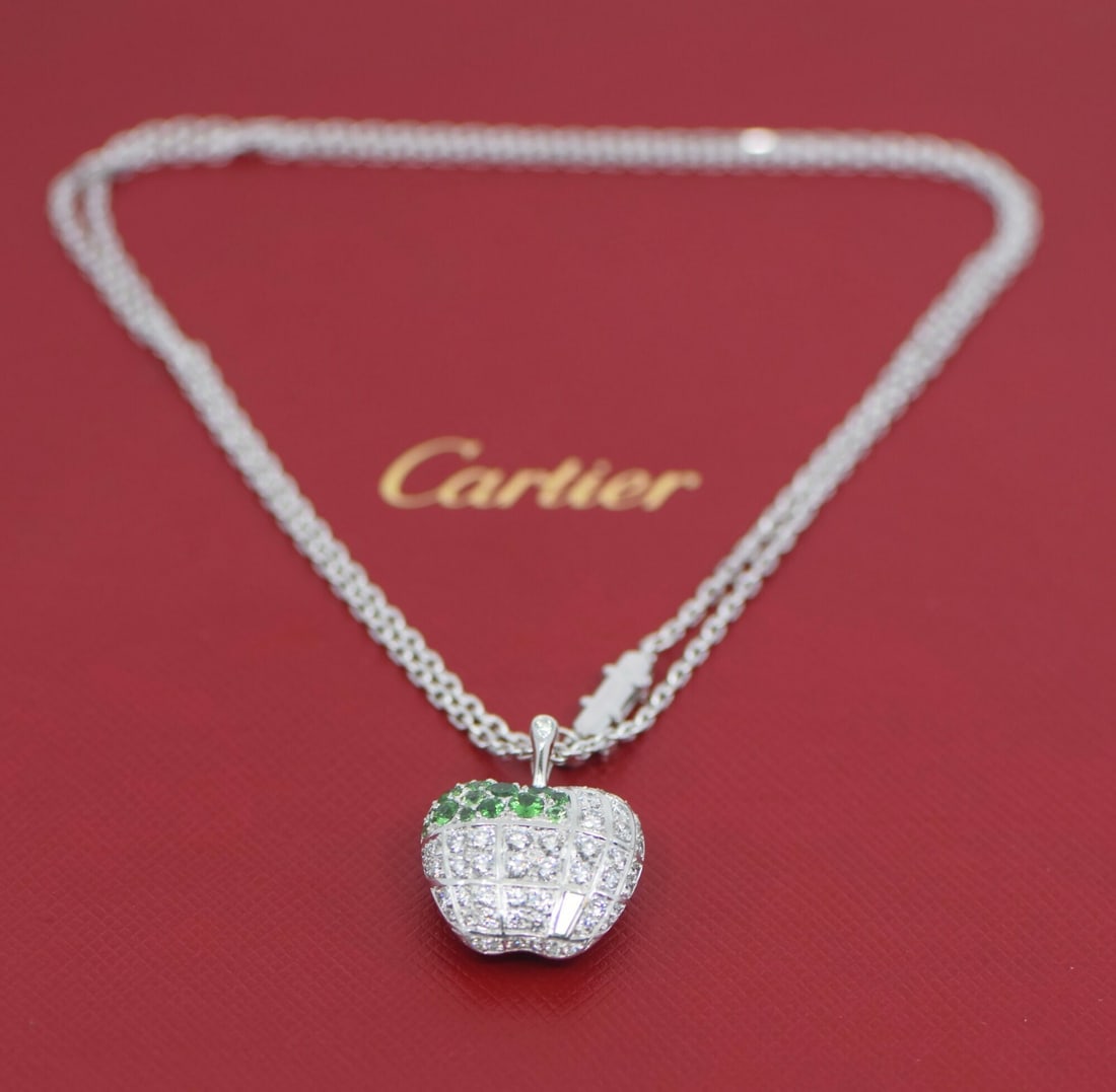 Cartier Landmark Celebration Limited Edition 18K White Gold Diamond Apple Pendant: Cartier Landmark Celebration Limited Edition 18K White Gold Diamond Apple Pendant This exquisite Cartier Landmark Celebration Limited Edition Diamond Apple Pendant is crafted from 18K white gold, show