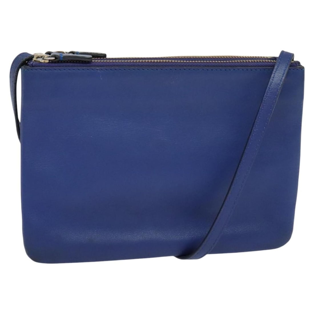 Celine Leather Trio Crossbody Bag in Blue: Celine Leather Trio Crossbody Bag in Blue This Celine Trio Crossbody Bag is crafted from leather in a blue color, designed for female use. It features a compact silhouette with three separate zippered