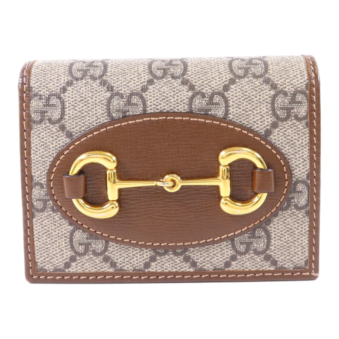 Gucci Horsebit 1955 Brown Calfskin Coated Canvas Bifold Wallet: Gucci Horsebit 1955 Brown Calfskin Coated Canvas Bifold Wallet This Gucci Horsebit 1955 bi-fold wallet is crafted from brown calfskin leather and coated canvas. It features gold tone hardware and show