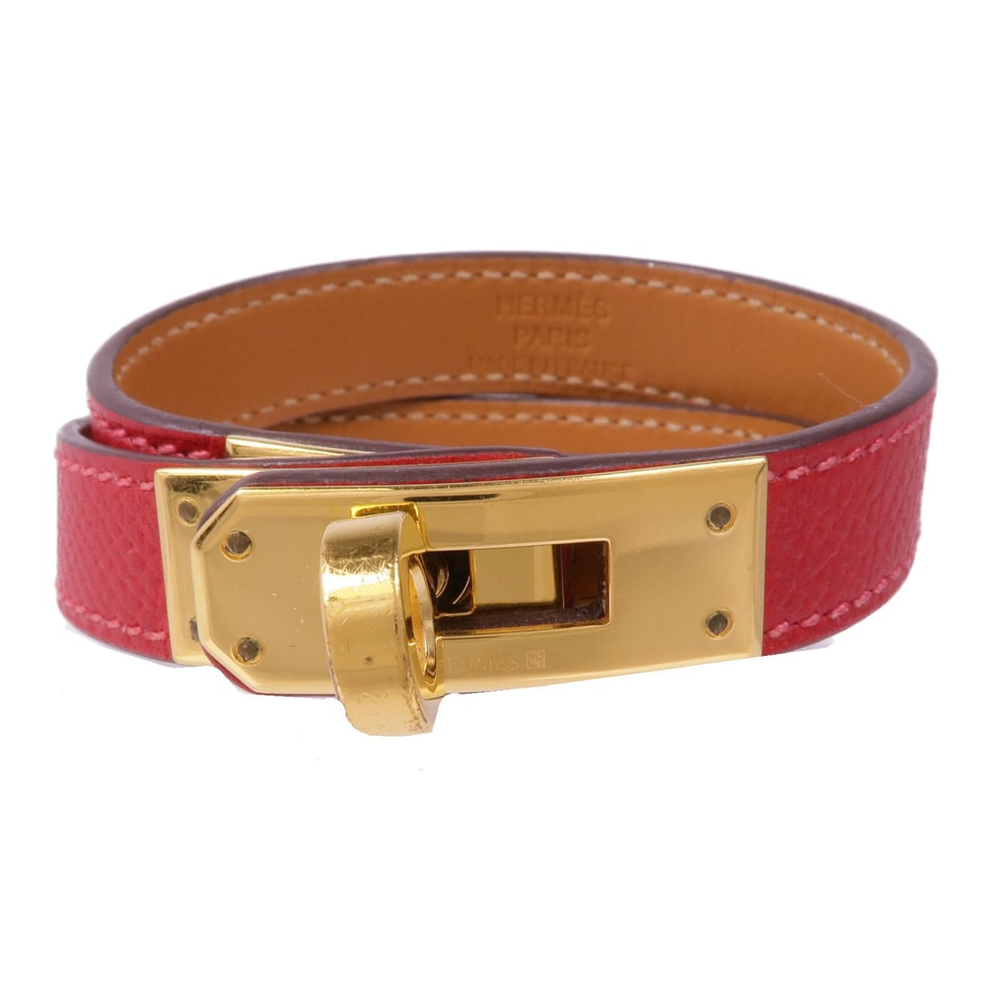 HERMES Kelly Double Tour Bracelet Red Epsom Leather: HERMES Kelly Double Tour Bracelet Red Epsom Leather Elevate your accessory collection with this stunning HERMES Kelly Double Tour Bracelet. Crafted from high-quality Epsom leather, this bracelet featu