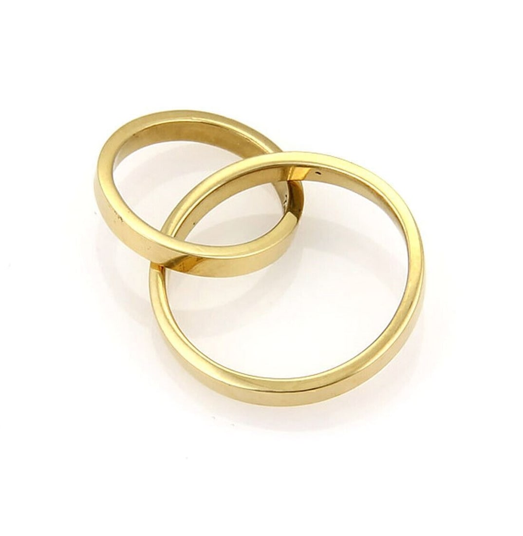 Paloma Picasso Double Flat Circle 18k Gold Charm Pendant by Tiffany & Co.: Paloma Picasso Double Flat Circle 18k Gold Charm Pendant by Tiffany & Co. This vintage Tiffany & Co. Paloma Picasso Double Flat Circle Charm Pendant features a sleek, minimalist design crafted in 18k