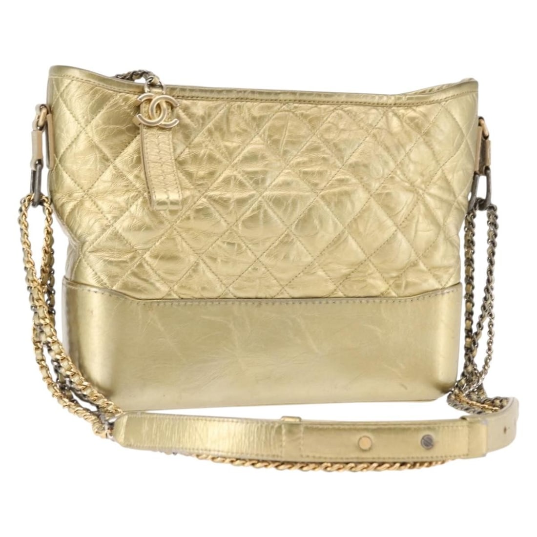 Gabrielle Quilted Leather Hobo Bag Gold Tone by Chanel: Gabrielle Quilted Leather Hobo Bag Gold Tone by Chanel This Chanel Gabrielle Hobo bag features a quilted metallic aged calfskin leather design in gold color. It is a pre-owned women's shoulder bag fro