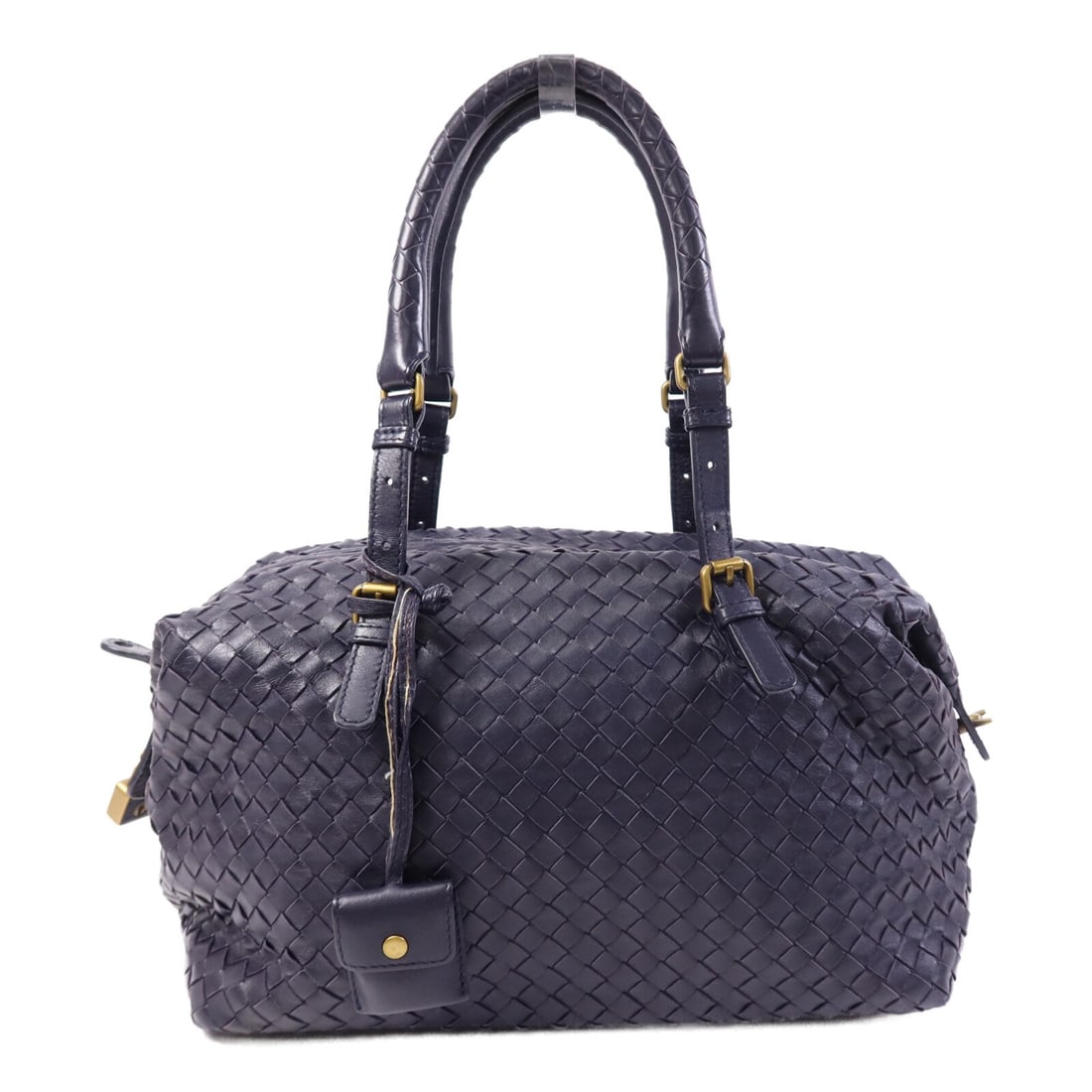 Navy Intrecciato Leather Shoulder Bag by Bottega Veneta: Navy Intrecciato Leather Shoulder Bag by Bottega Veneta This Bottega Veneta shoulder bag features the brand's signature intrecciato leather in a sophisticated navy color. Crafted in Italy, it offers a
