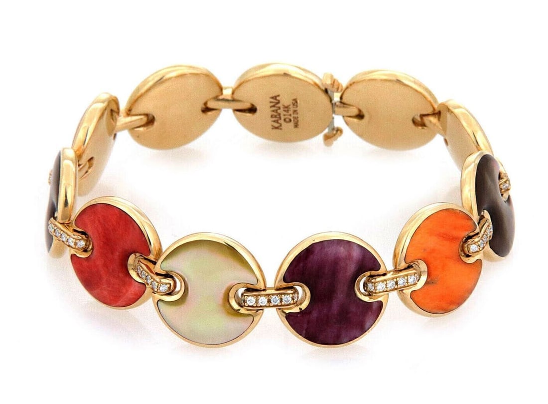14k Yellow Gold Kabana Bracelet With Spiny Oyster Mother of Pearl and Diamonds: 14k Yellow Gold Kabana Bracelet With Spiny Oyster Mother of Pearl and Diamonds This authentic Kabana bracelet is expertly crafted in solid 14k yellow gold and features alternating round button links i