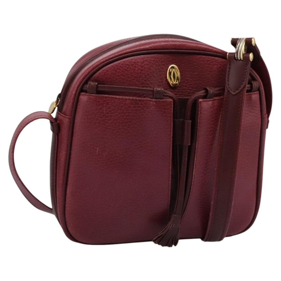Leather Burgundy Cartier Must de Shoulder Handbag 19cm by Cartier: Leather Burgundy Cartier Must de Shoulder Handbag 19cm by Cartier This pre-owned Cartier Must de Cartier shoulder bag is crafted from burgundy leather. Designed for women, it features a compact