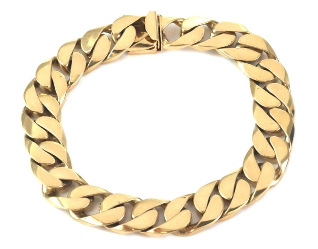 Vintage 14k Yellow Gold Cuban Link Chain Bracelet 9 Inch: Vintage 14k Yellow Gold Cuban Link Chain Bracelet 9 Inch This vintage Cuban link bracelet features a classic chain design and is crafted from 14k yellow gold. The bracelet has a timeless appeal and is