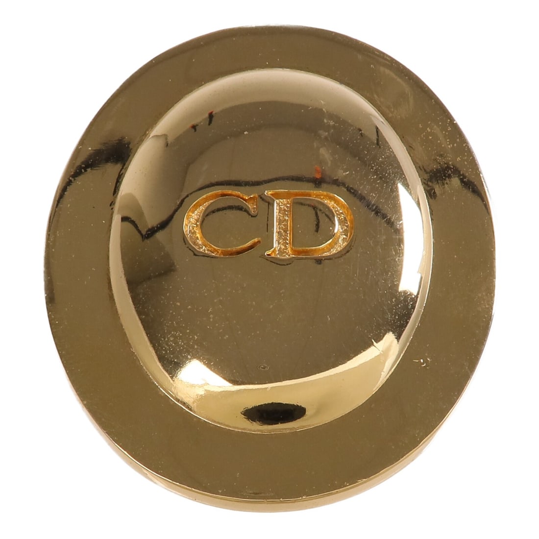 Dior Gold Tone Metal Brooch with CD Monogram France: Dior Gold Tone Metal Brooch with CD Monogram France This Christian Dior brooch features a gold-toned metal design. The brooch does not contain any stones and is crafted in France, reflecting the brand