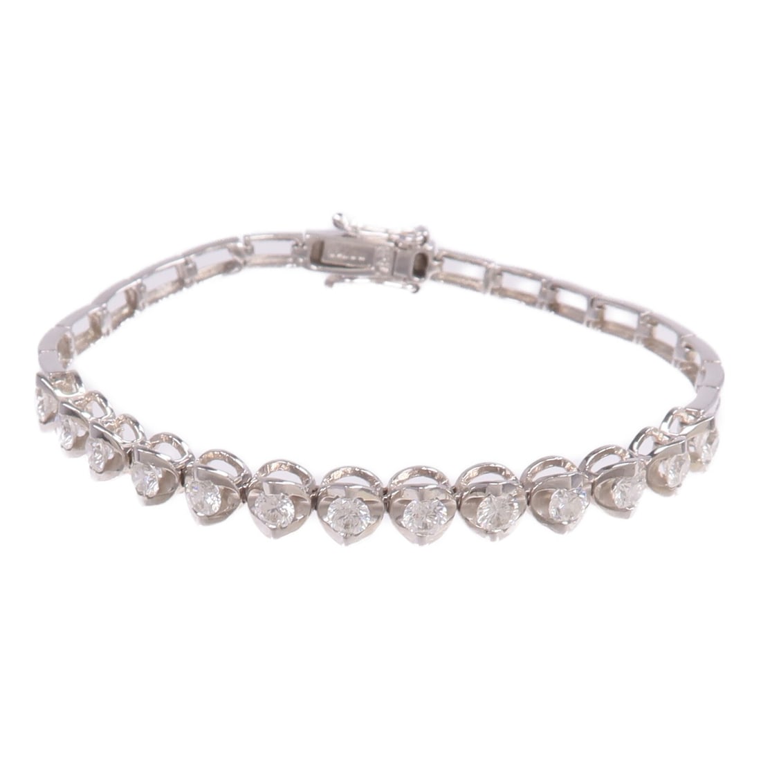 Diamond Tennis Bracelet in 18K White Gold: Diamond Tennis Bracelet in 18K White Gold This elegant bracelet is crafted from 18K white gold and features clear diamonds, offering a sophisticated and timeless design. The piece is in very good cond