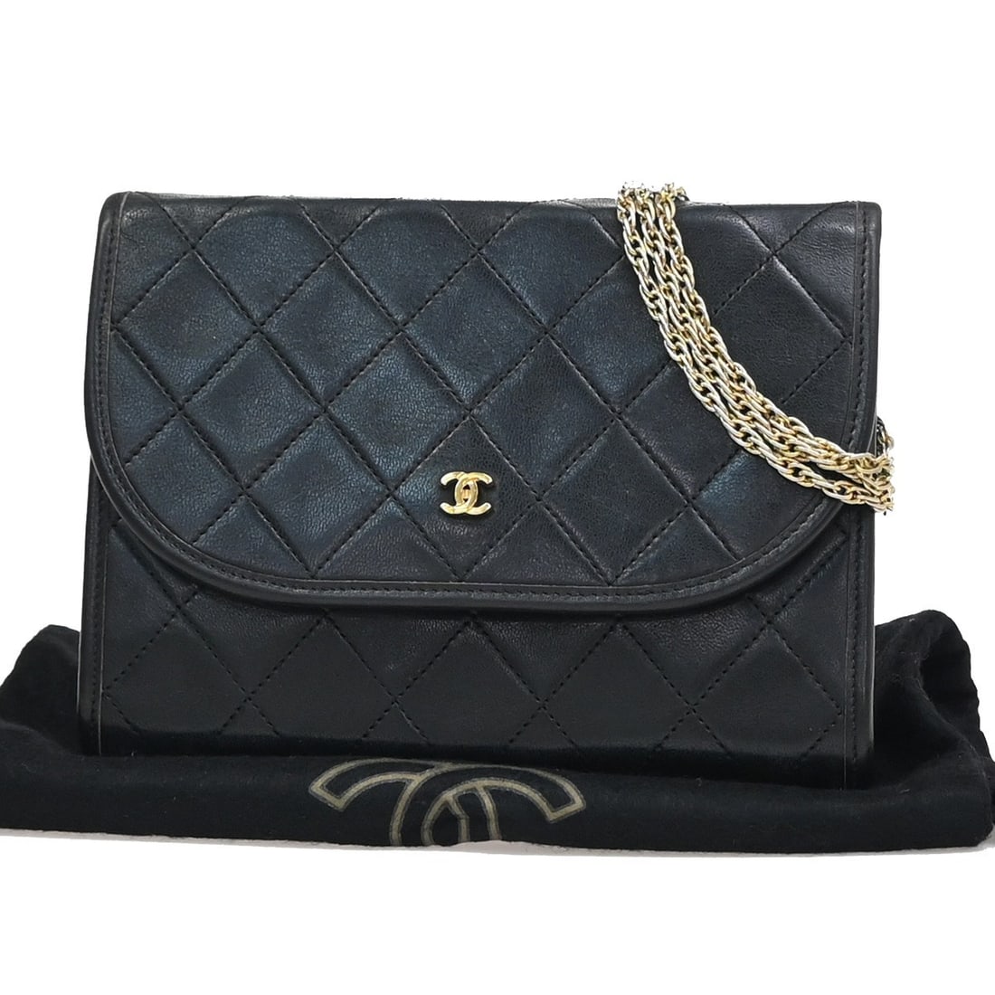 Chanel Black Quilted Lambskin Vintage Round Flap Bag 17cm: Chanel Black Quilted Lambskin Vintage Round Flap Bag 17cm This vintage Chanel round flap bag is crafted from black quilted lambskin leather, designed for female use. It features a compact silhouette s