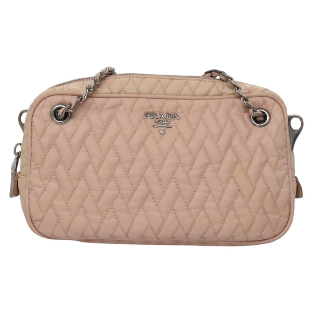Pink Nylon Prada Quilted Camera Crossbody Bag 21cm x 12cm x 5cm: Pink Nylon Prada Quilted Camera Crossbody Bag 21cm x 12cm x 5cm This Prada Camera Bag features a quilted pink nylon exterior, designed for women. The pre-owned handbag shows signs of prior use, includ