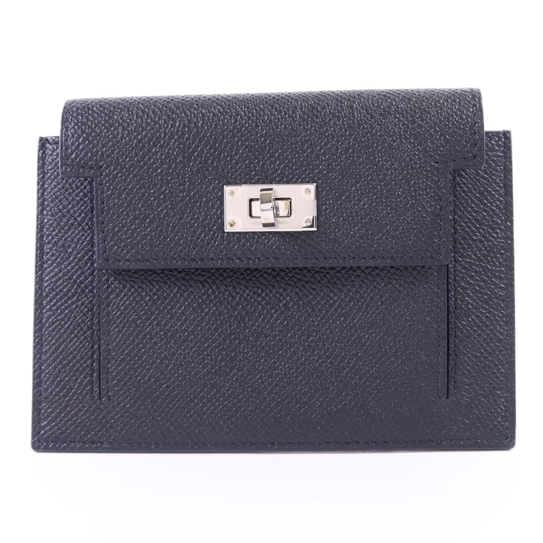 Black Epsom Leather Kelly Pocket Compact Bi-fold Wallet by Hermes PHW: Black Epsom Leather Kelly Pocket Compact Bi-fold Wallet by Hermes PHW This Hermes Kelly Pocket Compact Wallet is crafted from black Epsom calfskin leather in a bi-fold design. It features palladium ha