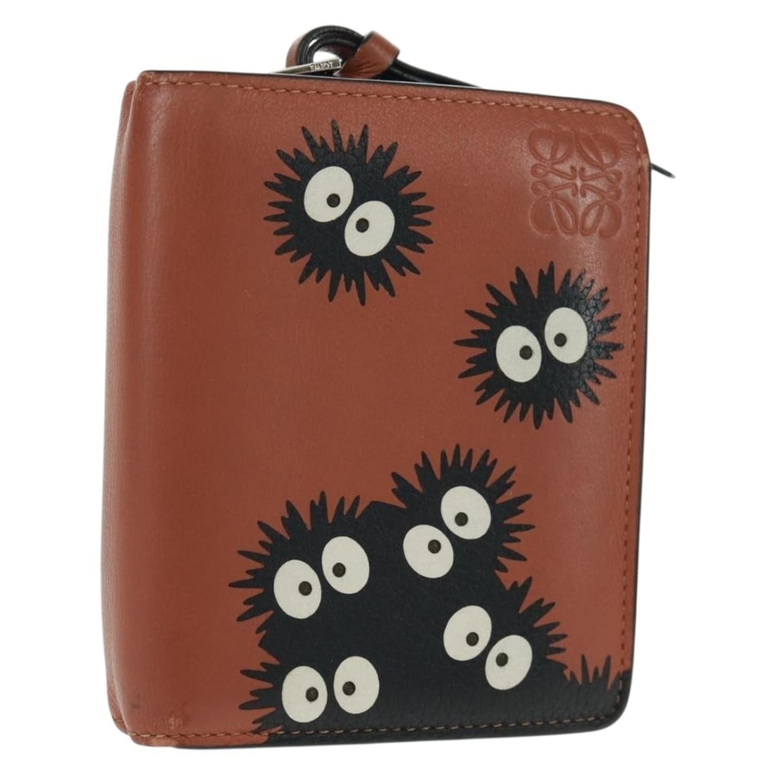 Loewe Leather Wallet in Black and Brown Spain: Loewe Leather Wallet in Black and Brown Spain This LOEWE wallet features a stylish black and brown leather design. Manufactured in Spain, it offers compact dimensions and practical organization. The w