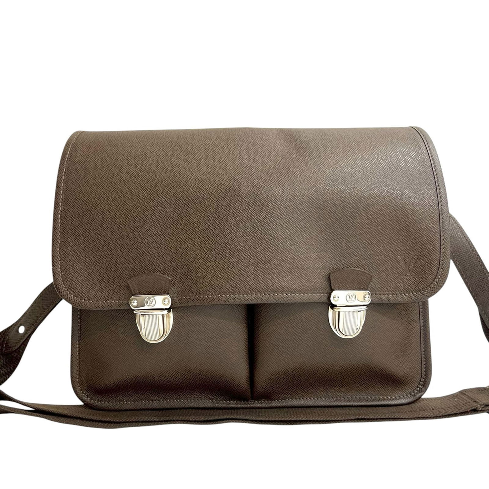 Louis Vuitton Alexei Messenger Brown Taiga Leather Crossbody Bag: Louis Vuitton Alexei Messenger Brown Taiga Leather Crossbody Bag The Louis Vuitton Taiga Alexei Messenger features a brown taiga leather body with a flap secured by push-lock closures. It offers an ad